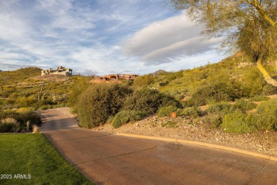 Nestled in a serene, gated community on a near-acre lot on Gold Canyon Golf Resort - Dinosaur Mountain in Arizona - for sale on GolfHomes.com, golf home, golf lot