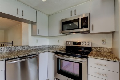 Welcome to El Pasado Condominiums, a quiet, well-maintained on Tarpon Woods Golf Club in Florida - for sale on GolfHomes.com, golf home, golf lot