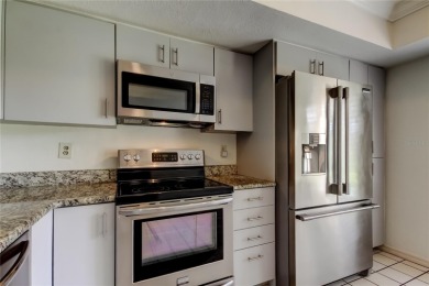 Welcome to El Pasado Condominiums, a quiet, well-maintained on Tarpon Woods Golf Club in Florida - for sale on GolfHomes.com, golf home, golf lot