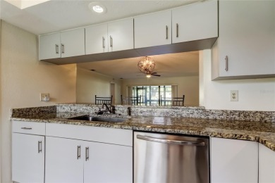 Welcome to El Pasado Condominiums, a quiet, well-maintained on Tarpon Woods Golf Club in Florida - for sale on GolfHomes.com, golf home, golf lot