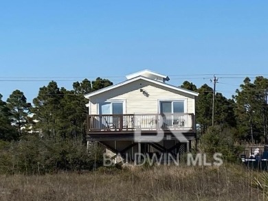 THIS HAS IT ALL !! Third Tier RENOVATED BEACH HOUSE WITH POOL! on Kiva Dunes Golf Club in Alabama - for sale on GolfHomes.com, golf home, golf lot