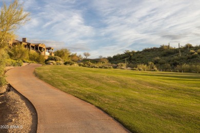 Nestled in a serene, gated community on a near-acre lot on Gold Canyon Golf Resort - Dinosaur Mountain in Arizona - for sale on GolfHomes.com, golf home, golf lot