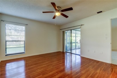 Welcome to El Pasado Condominiums, a quiet, well-maintained on Tarpon Woods Golf Club in Florida - for sale on GolfHomes.com, golf home, golf lot