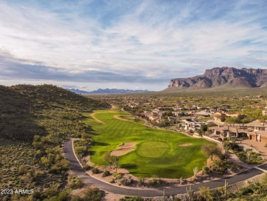 Nestled in a serene, gated community on a near-acre lot on Gold Canyon Golf Resort - Dinosaur Mountain in Arizona - for sale on GolfHomes.com, golf home, golf lot