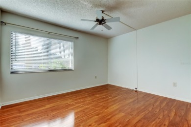 Welcome to El Pasado Condominiums, a quiet, well-maintained on Tarpon Woods Golf Club in Florida - for sale on GolfHomes.com, golf home, golf lot