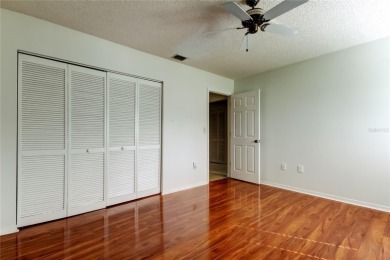 Welcome to El Pasado Condominiums, a quiet, well-maintained on Tarpon Woods Golf Club in Florida - for sale on GolfHomes.com, golf home, golf lot