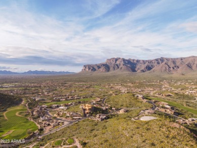 Nestled in a serene, gated community on a near-acre lot on Gold Canyon Golf Resort - Dinosaur Mountain in Arizona - for sale on GolfHomes.com, golf home, golf lot