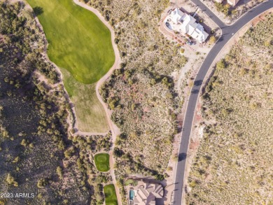 Nestled in a serene, gated community on a near-acre lot on Gold Canyon Golf Resort - Dinosaur Mountain in Arizona - for sale on GolfHomes.com, golf home, golf lot