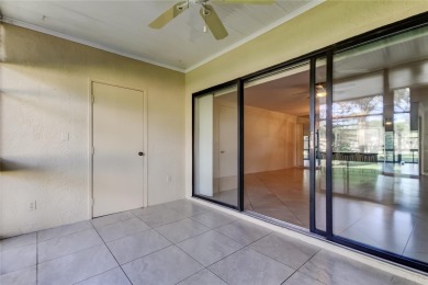 Welcome to El Pasado Condominiums, a quiet, well-maintained on Tarpon Woods Golf Club in Florida - for sale on GolfHomes.com, golf home, golf lot
