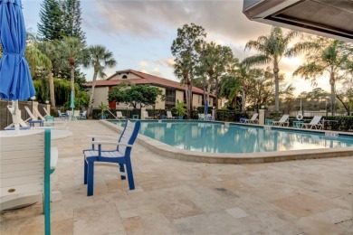 Welcome to El Pasado Condominiums, a quiet, well-maintained on Tarpon Woods Golf Club in Florida - for sale on GolfHomes.com, golf home, golf lot