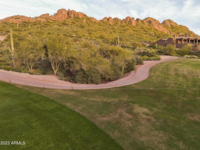 Nestled in a serene, gated community on a near-acre lot on Gold Canyon Golf Resort - Dinosaur Mountain in Arizona - for sale on GolfHomes.com, golf home, golf lot