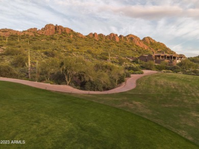 Nestled in a serene, gated community on a near-acre lot on Gold Canyon Golf Resort - Dinosaur Mountain in Arizona - for sale on GolfHomes.com, golf home, golf lot