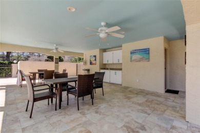 Welcome to El Pasado Condominiums, a quiet, well-maintained on Tarpon Woods Golf Club in Florida - for sale on GolfHomes.com, golf home, golf lot