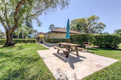 Welcome to El Pasado Condominiums, a quiet, well-maintained on Tarpon Woods Golf Club in Florida - for sale on GolfHomes.com, golf home, golf lot