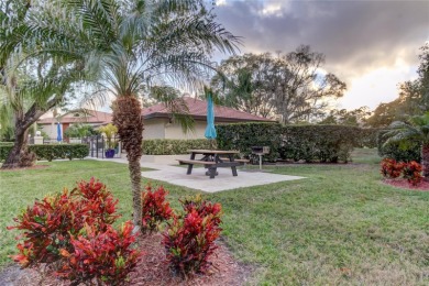 Welcome to El Pasado Condominiums, a quiet, well-maintained on Tarpon Woods Golf Club in Florida - for sale on GolfHomes.com, golf home, golf lot
