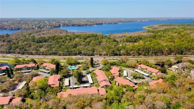 Welcome to El Pasado Condominiums, a quiet, well-maintained on Tarpon Woods Golf Club in Florida - for sale on GolfHomes.com, golf home, golf lot