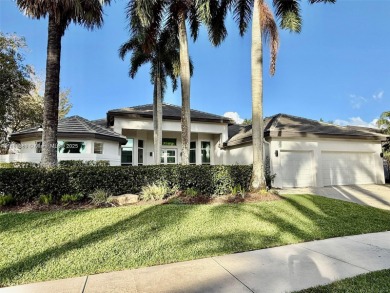 Live the ultimate Weston Hills lifestyle in this impeccably on Weston Hills Country Club in Florida - for sale on GolfHomes.com, golf home, golf lot