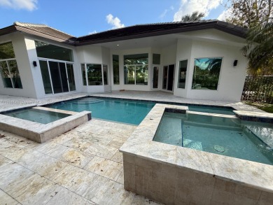Live the ultimate Weston Hills lifestyle in this impeccably on Weston Hills Country Club in Florida - for sale on GolfHomes.com, golf home, golf lot