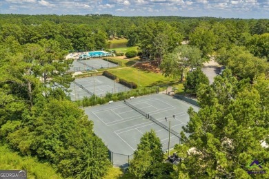 Luxury living in a premier community located in cul-de-sac on on Canongate At Healy Point Country Club in Georgia - for sale on GolfHomes.com, golf home, golf lot