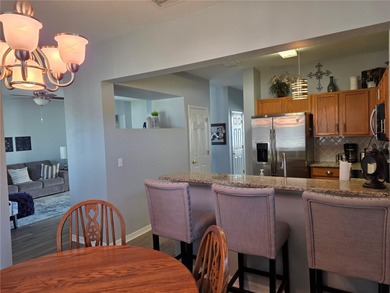 This 2-bedroom, 2-bath Amelia model home in Del Webb Spruce on Eagle Ridge At Spruce Creek Country Club in Florida - for sale on GolfHomes.com, golf home, golf lot