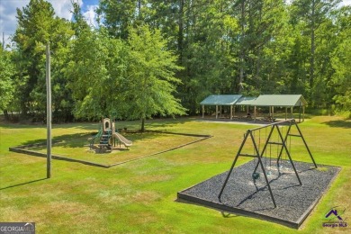 Luxury living in a premier community located in cul-de-sac on on Canongate At Healy Point Country Club in Georgia - for sale on GolfHomes.com, golf home, golf lot
