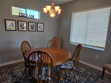 This 2-bedroom, 2-bath Amelia model home in Del Webb Spruce on Eagle Ridge At Spruce Creek Country Club in Florida - for sale on GolfHomes.com, golf home, golf lot