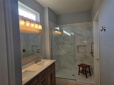 This 2-bedroom, 2-bath Amelia model home in Del Webb Spruce on Eagle Ridge At Spruce Creek Country Club in Florida - for sale on GolfHomes.com, golf home, golf lot