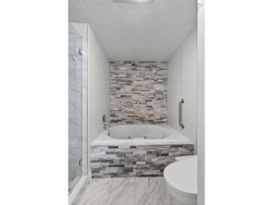 This beautifully redone two-bedroom, two-bath condo offers a on Hunters Run Golf and Country Club in Florida - for sale on GolfHomes.com, golf home, golf lot