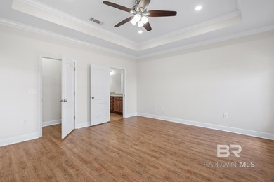 Take a dip in your private, heated pool year-round as you enjoy on Craft Farms - Cypress Bend in Alabama - for sale on GolfHomes.com, golf home, golf lot