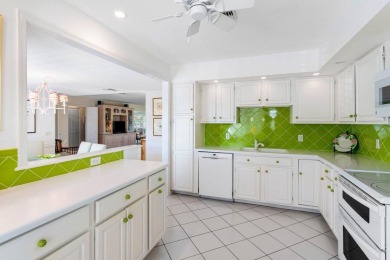 Discover the charm of this inviting 3-bedroom, 2-bathroom home on Quail Ridge Golf Course and Country Club in Florida - for sale on GolfHomes.com, golf home, golf lot
