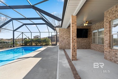 Take a dip in your private, heated pool year-round as you enjoy on Craft Farms - Cypress Bend in Alabama - for sale on GolfHomes.com, golf home, golf lot