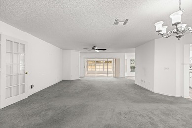 This Hanover model home is located in the much sought after 55+ on On Top of the World Golf Course in Florida - for sale on GolfHomes.com, golf home, golf lot