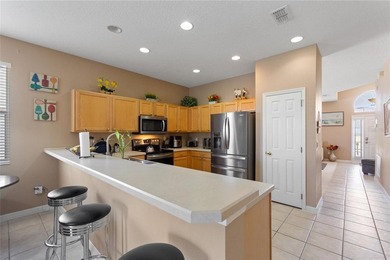 THIS GORGEOUS 4-BEDROOM, 2-BATH MODEL IS SITUATED IN THE on Highlands Reserve Golf Club in Florida - for sale on GolfHomes.com, golf home, golf lot