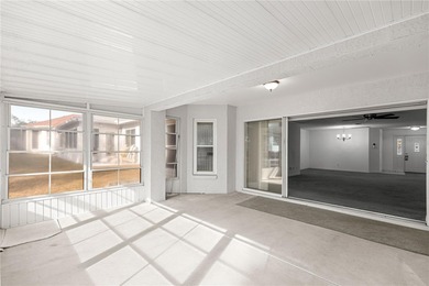 This Hanover model home is located in the much sought after 55+ on On Top of the World Golf Course in Florida - for sale on GolfHomes.com, golf home, golf lot