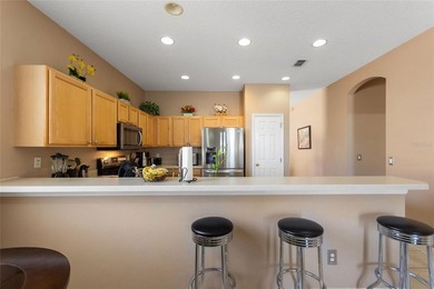 THIS GORGEOUS 4-BEDROOM, 2-BATH MODEL IS SITUATED IN THE on Highlands Reserve Golf Club in Florida - for sale on GolfHomes.com, golf home, golf lot