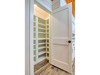 This 2 story beauty backs up to the national forest and is a 3 on Pendleton Harbor in Texas - for sale on GolfHomes.com, golf home, golf lot