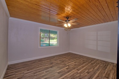 This 2 story beauty backs up to the national forest and is a 3 on Pendleton Harbor in Texas - for sale on GolfHomes.com, golf home, golf lot