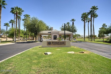 Located in the highly desirable guard-gated PebbleCreek active on Tuscany Falls At Pebble Creek in Arizona - for sale on GolfHomes.com, golf home, golf lot