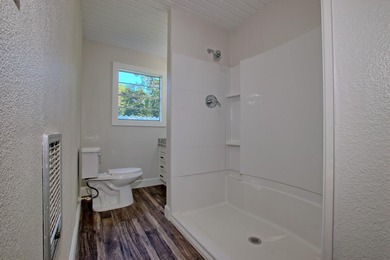 This 2 story beauty backs up to the national forest and is a 3 on Pendleton Harbor in Texas - for sale on GolfHomes.com, golf home, golf lot