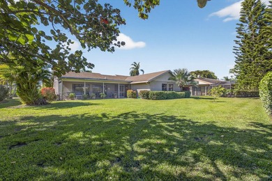 Beautifully maintained one-story, 4-bedroom home in highly on Eastpointe Country Club in Florida - for sale on GolfHomes.com, golf home, golf lot