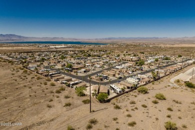 Welcome to the gated community of Havasu RV Resort. This resort on The Refuge Golf and Country Club in Arizona - for sale on GolfHomes.com, golf home, golf lot