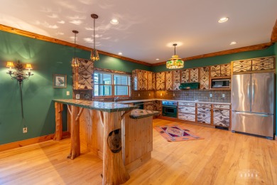 Experience the ultimate Adirondack lifestyle in this on Whiteface Club and Resort in New York - for sale on GolfHomes.com, golf home, golf lot