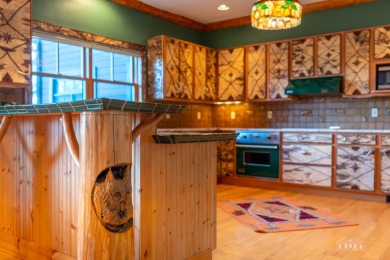 Experience the ultimate Adirondack lifestyle in this on Whiteface Club and Resort in New York - for sale on GolfHomes.com, golf home, golf lot