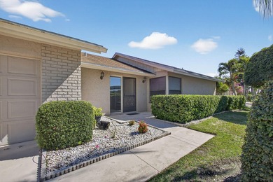 Beautifully maintained one-story, 4-bedroom home in highly on Eastpointe Country Club in Florida - for sale on GolfHomes.com, golf home, golf lot