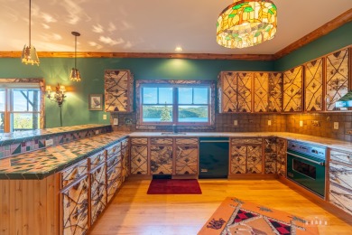 Experience the ultimate Adirondack lifestyle in this on Whiteface Club and Resort in New York - for sale on GolfHomes.com, golf home, golf lot