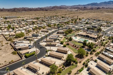 Welcome to the gated community of Havasu RV Resort. This resort on The Refuge Golf and Country Club in Arizona - for sale on GolfHomes.com, golf home, golf lot