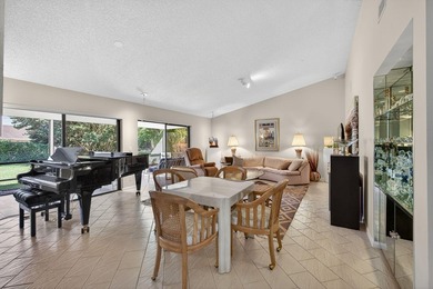 Beautifully maintained one-story, 4-bedroom home in highly on Eastpointe Country Club in Florida - for sale on GolfHomes.com, golf home, golf lot