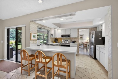 Beautifully maintained one-story, 4-bedroom home in highly on Eastpointe Country Club in Florida - for sale on GolfHomes.com, golf home, golf lot