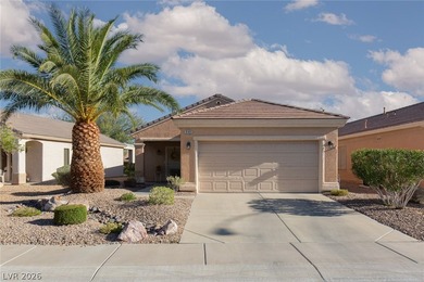 Charming single-story home in the heart of Sun City MacDonald on Desert Willow Golf Course in Nevada - for sale on GolfHomes.com, golf home, golf lot