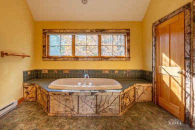 Experience the ultimate Adirondack lifestyle in this on Whiteface Club and Resort in New York - for sale on GolfHomes.com, golf home, golf lot